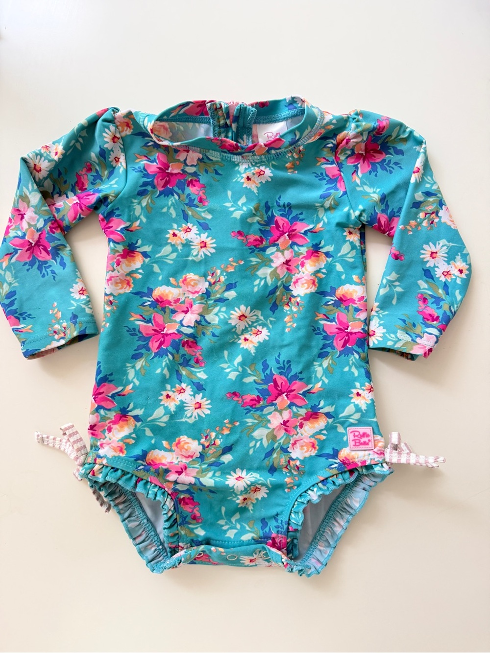 Ruffle Butts Teal Floral Long-Sleeve One-Piece Swimsuit with Pink Accents